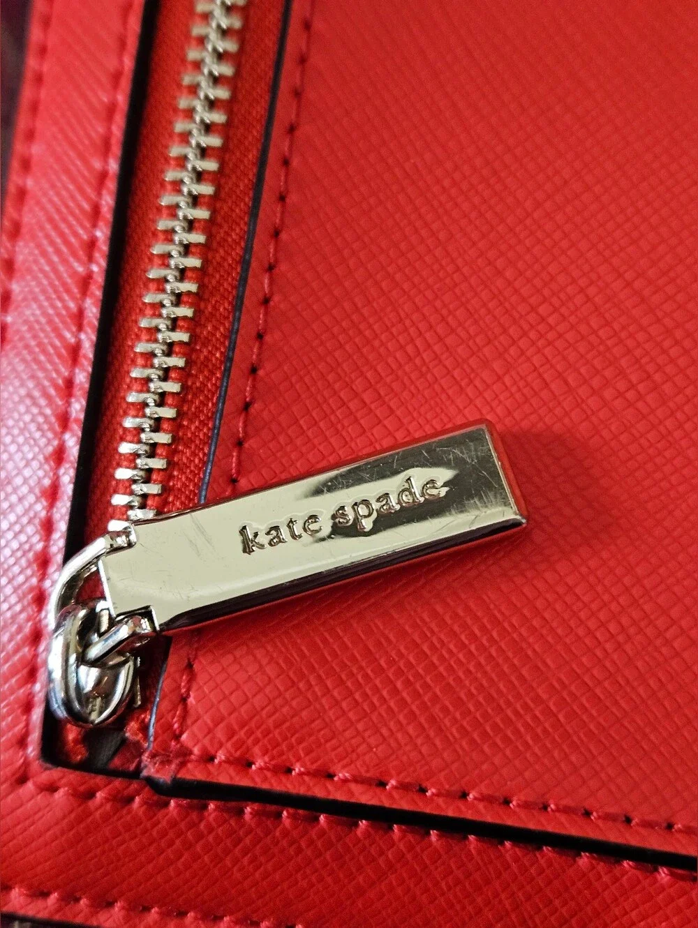Kate Spade New York coral orange Saffiano leather continental wallet